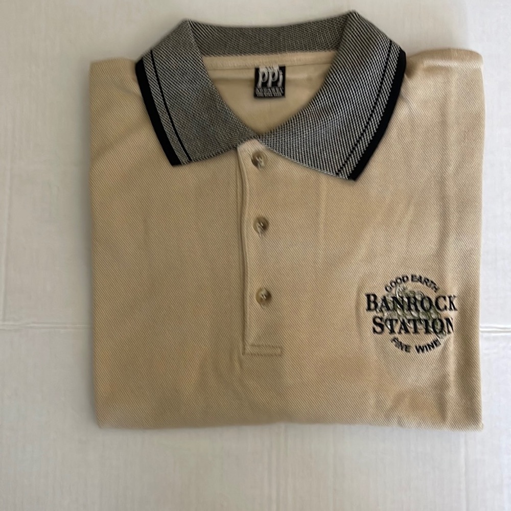 NWOT polo with Banrock Station logo on front. XXL